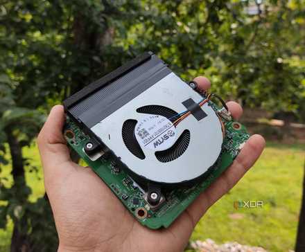 Your Old Chromebook: An Unexpected Home Server Solution 6 A person holding an Intel N100 system