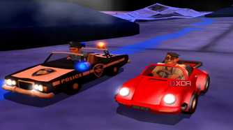 A screenshot from the game Micro Machines, showing a police car and a red coupe ready to race each other.