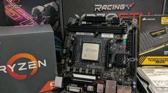 An AMD AM4 motherboard with a CPU installed onto it.