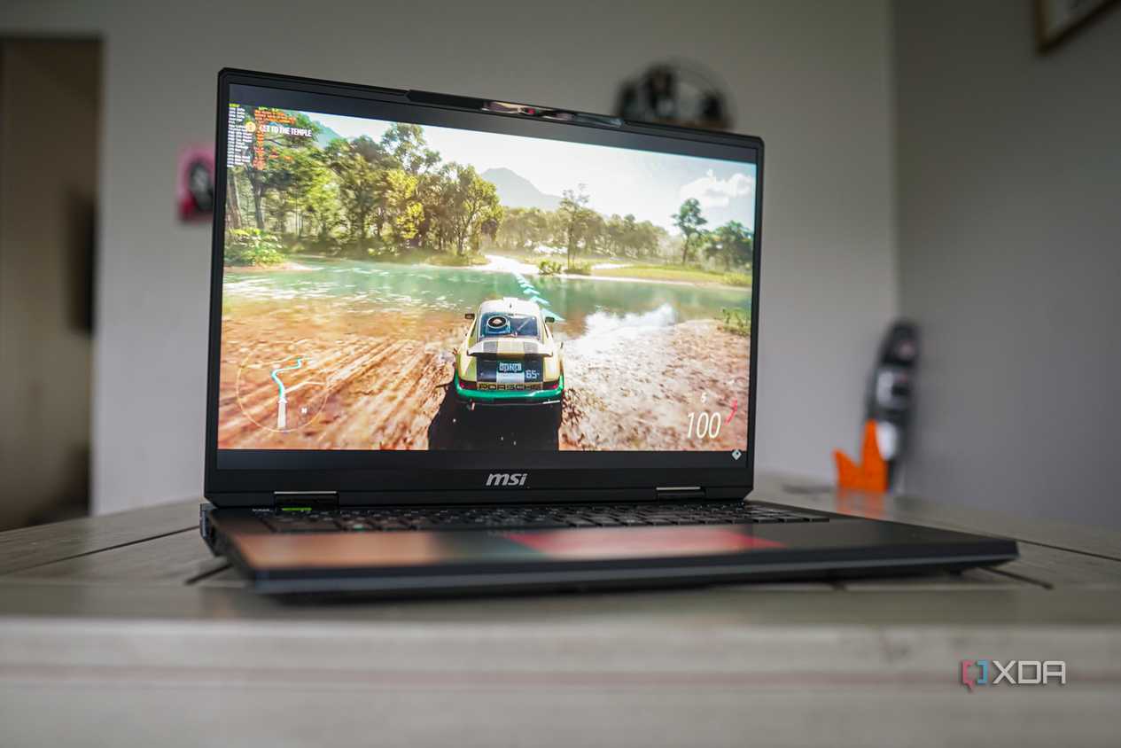 MSI Titan 18 gaming laptop on a gray table.