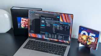 A laptop connected Proxmox and TrueNAS dashboards on the web