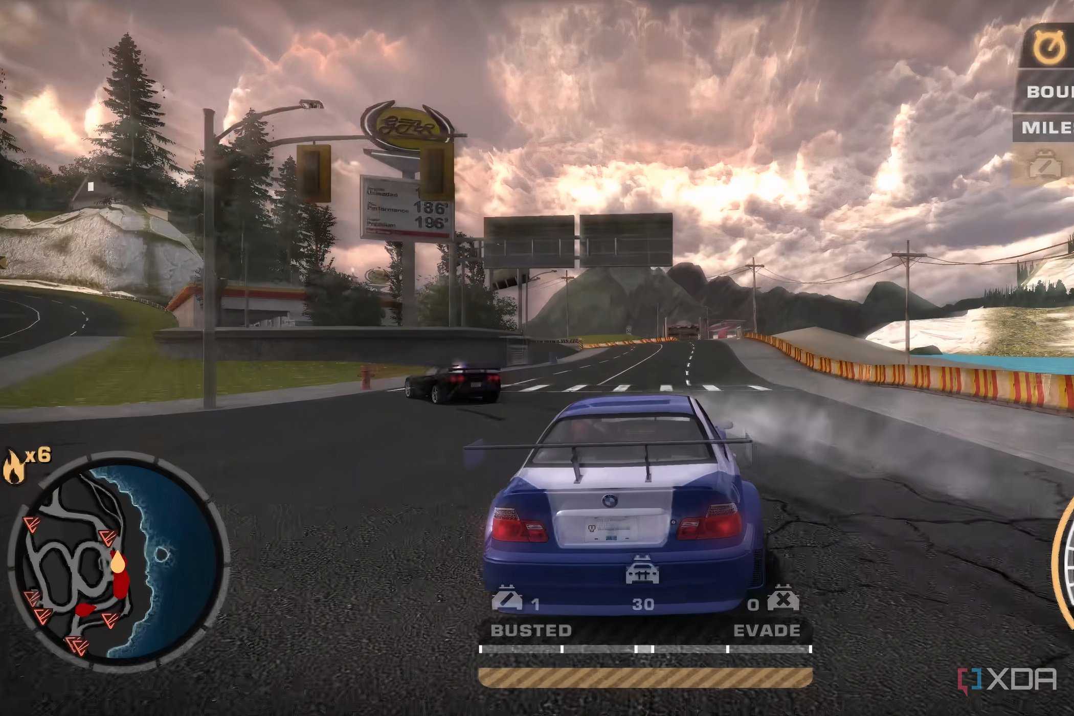 The BMW M3 GTR being chased by cops in Need for Speed: Most Wanted.