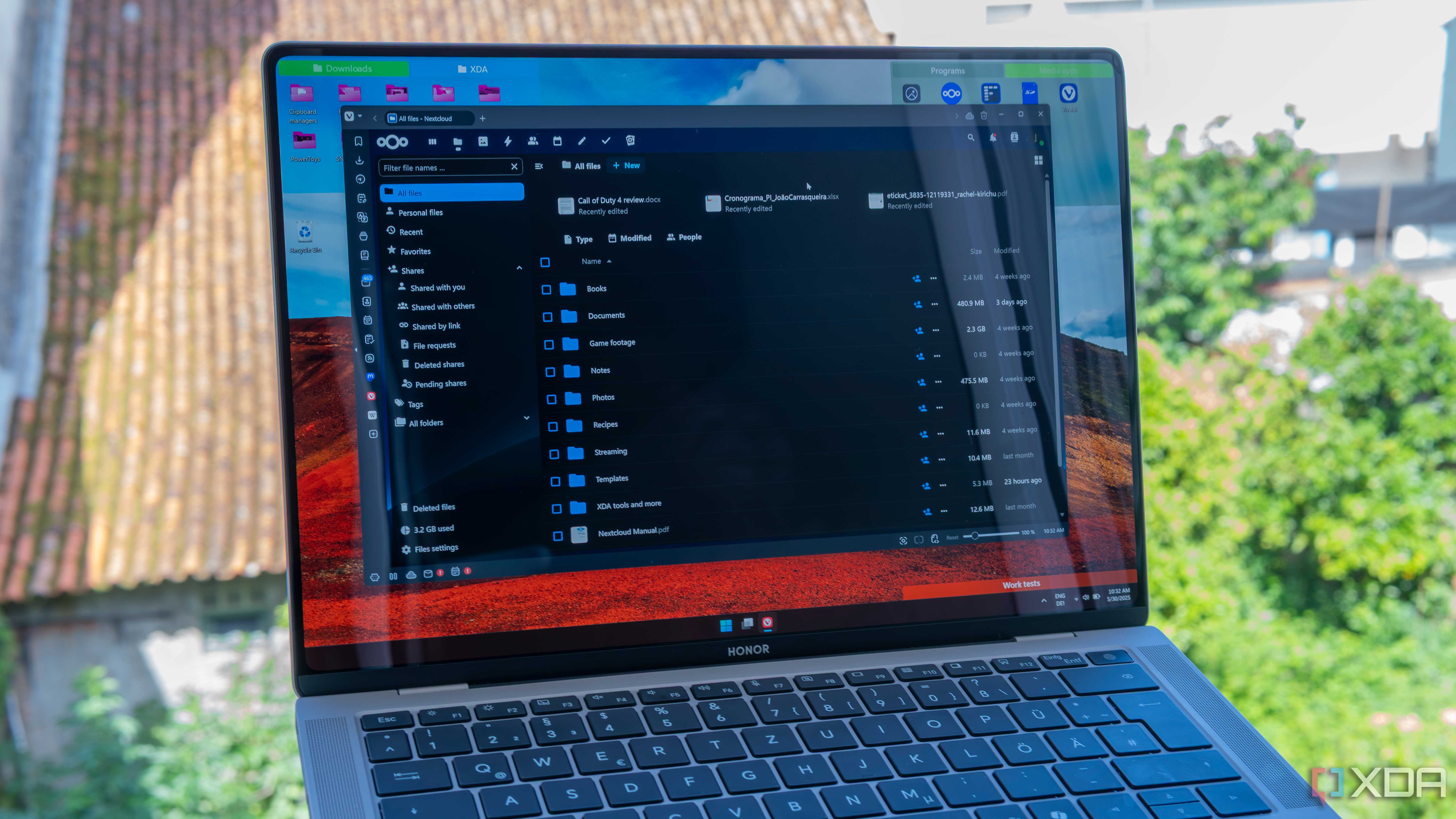 A Windows 11 laptop running a web browser with the Nextcloud Web UI