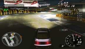 A screenshot from the game Need for Speed: Underground 2, showing a Nissan 240SX racing in the game at night.