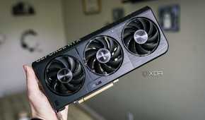 A hand holding the Nvidia GeForce RTX 5060.