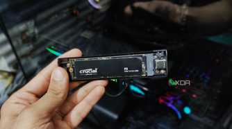 A hand holding an NVMe enclosure.