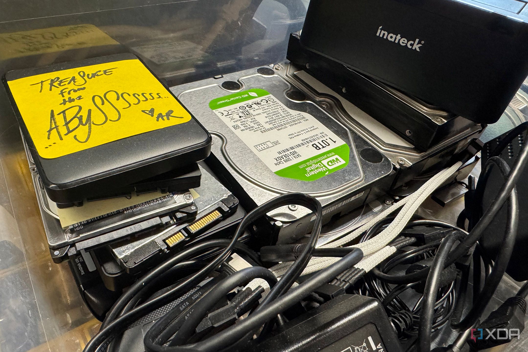 plastic storage with old hard drives