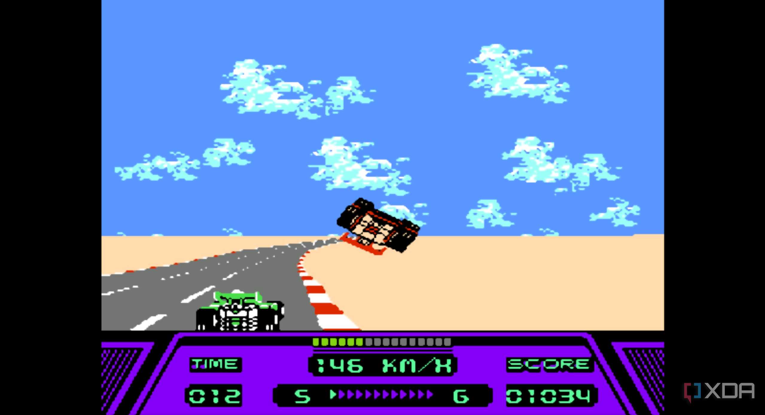A screenshot from the game Rad Racer running on a NES emulator, showing a red Formula 1 car flipped over in mid-air after a crash.