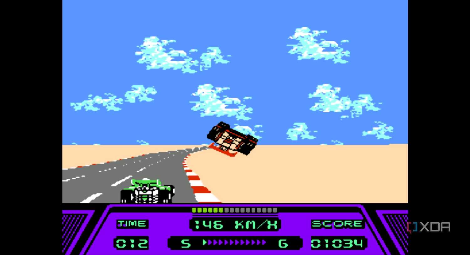A screenshot from the game Rad Racer running on a NES emulator, showing a red Formula 1 car flipped over in mid-air after a crash.