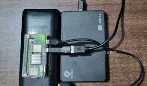 photo of raspberry pi downloading device with a power bank