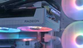 An image of a GPU installed horizontally on a motherboard.
