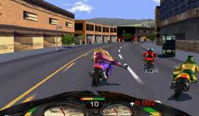 A screenshot from the game Road Rash, showing the player character attempting to kick off an opponent off their bike while racing.