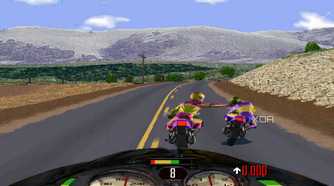 A screenshot from the game Road Rash, showing the player character punching another biker while racing.