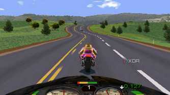 A screenshot from the game Road Rash, showing a bike racing down a road in the middle of grassy plains.