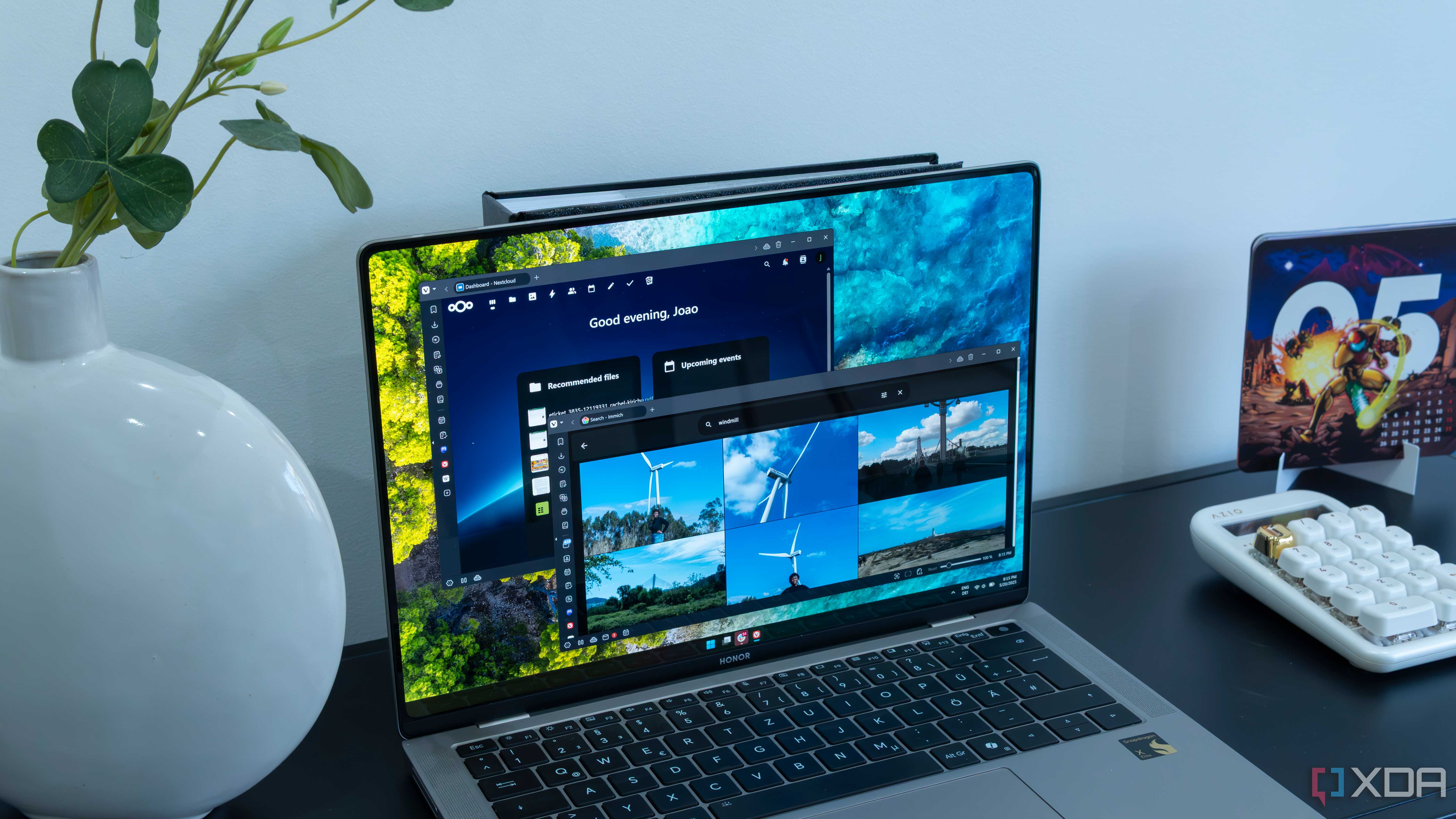 A laptop showing Immich and Nextcloud in a web browser