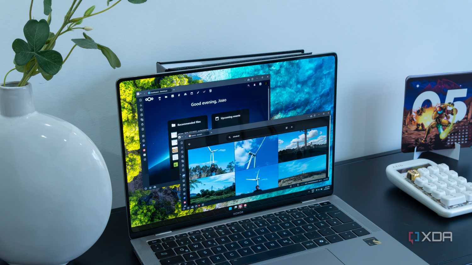 A laptop showing Immich and Nextcloud in a web browser