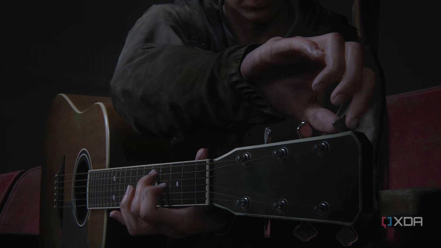 Ellie tuning the guitar in The Last of Us Part II.