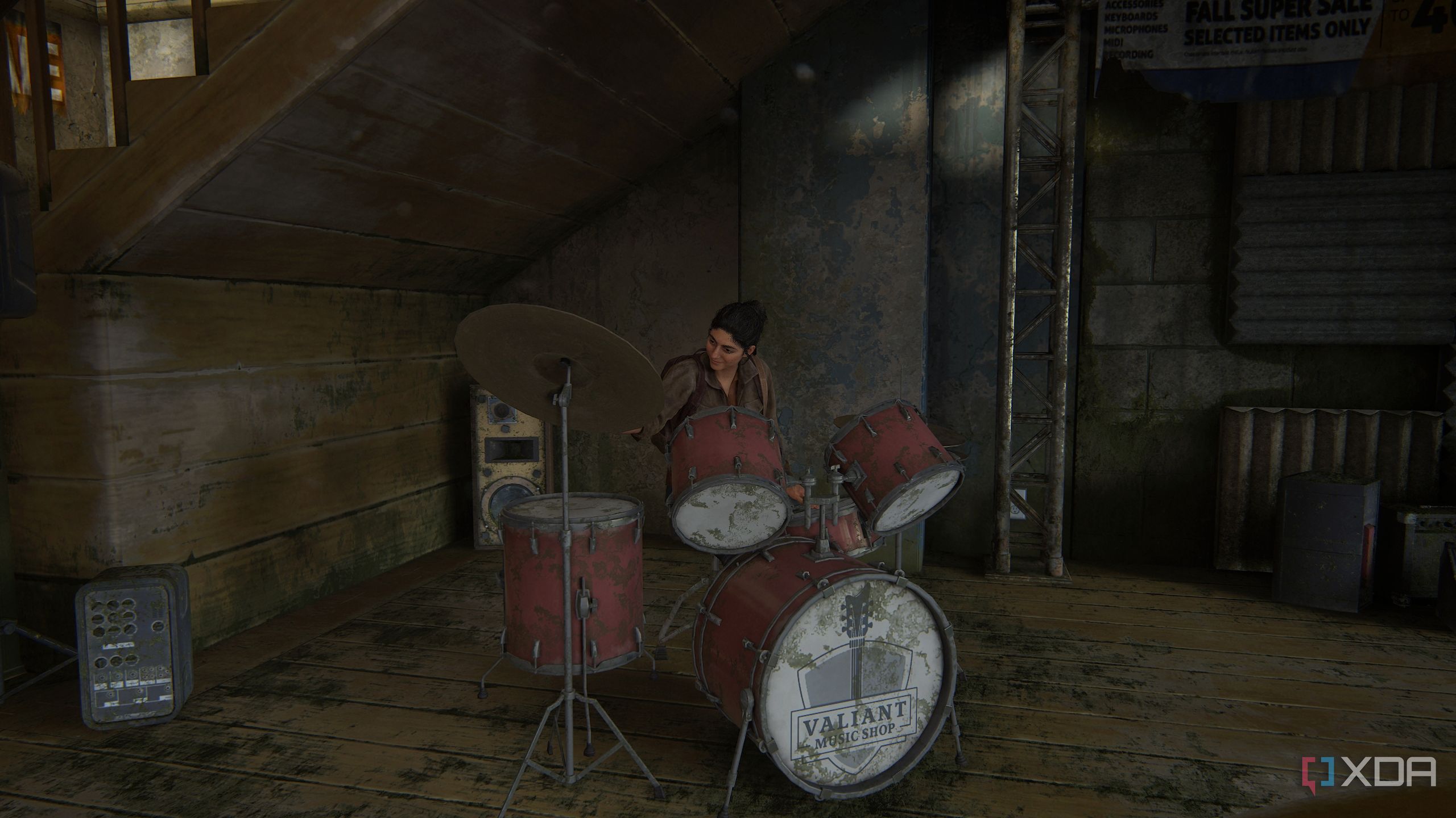 An image from the game The Last of Us Part II Remastered on PC, showing Dina playing the drums in a music shop.