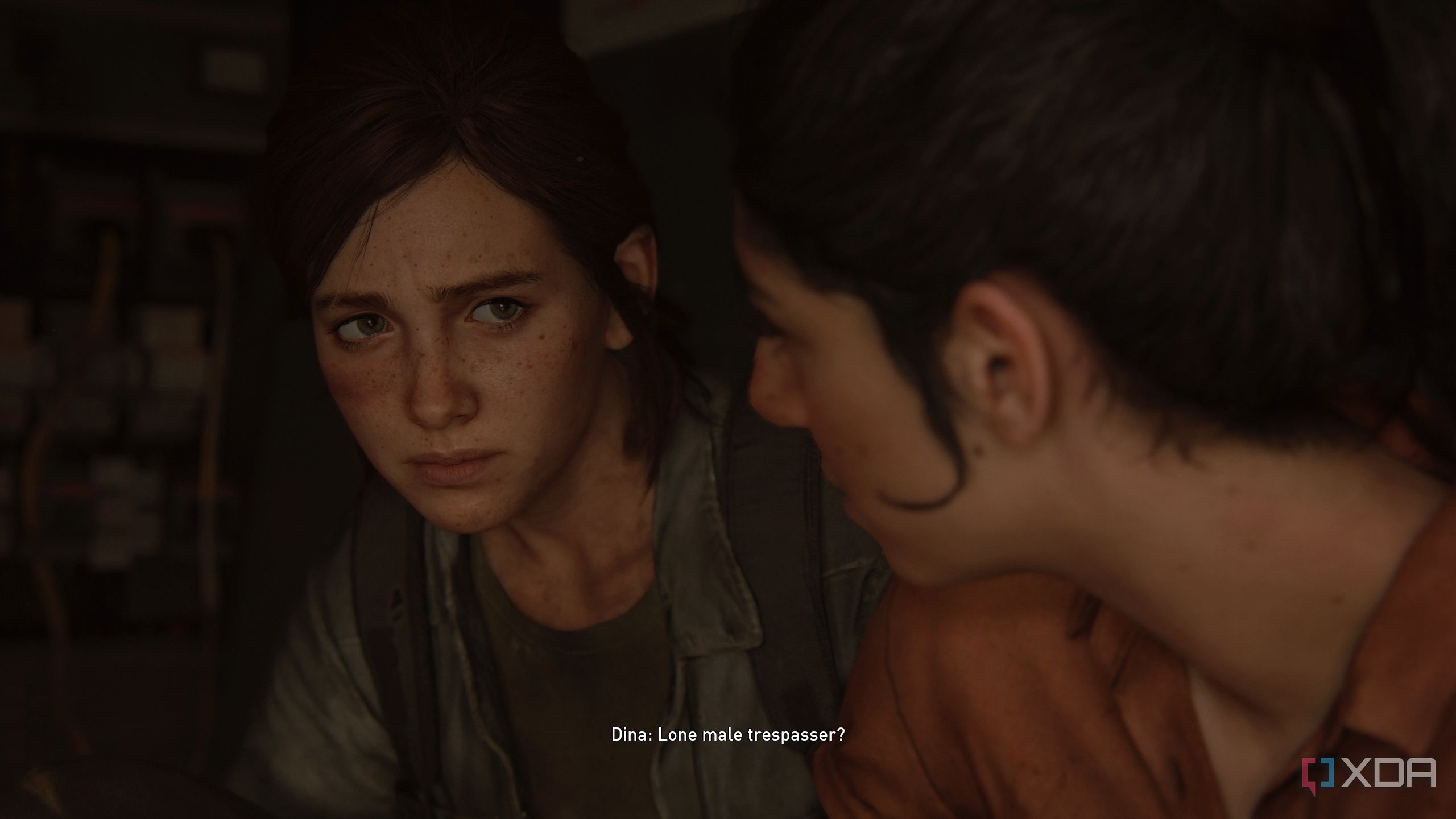 Dina and Ellie looking at each other.