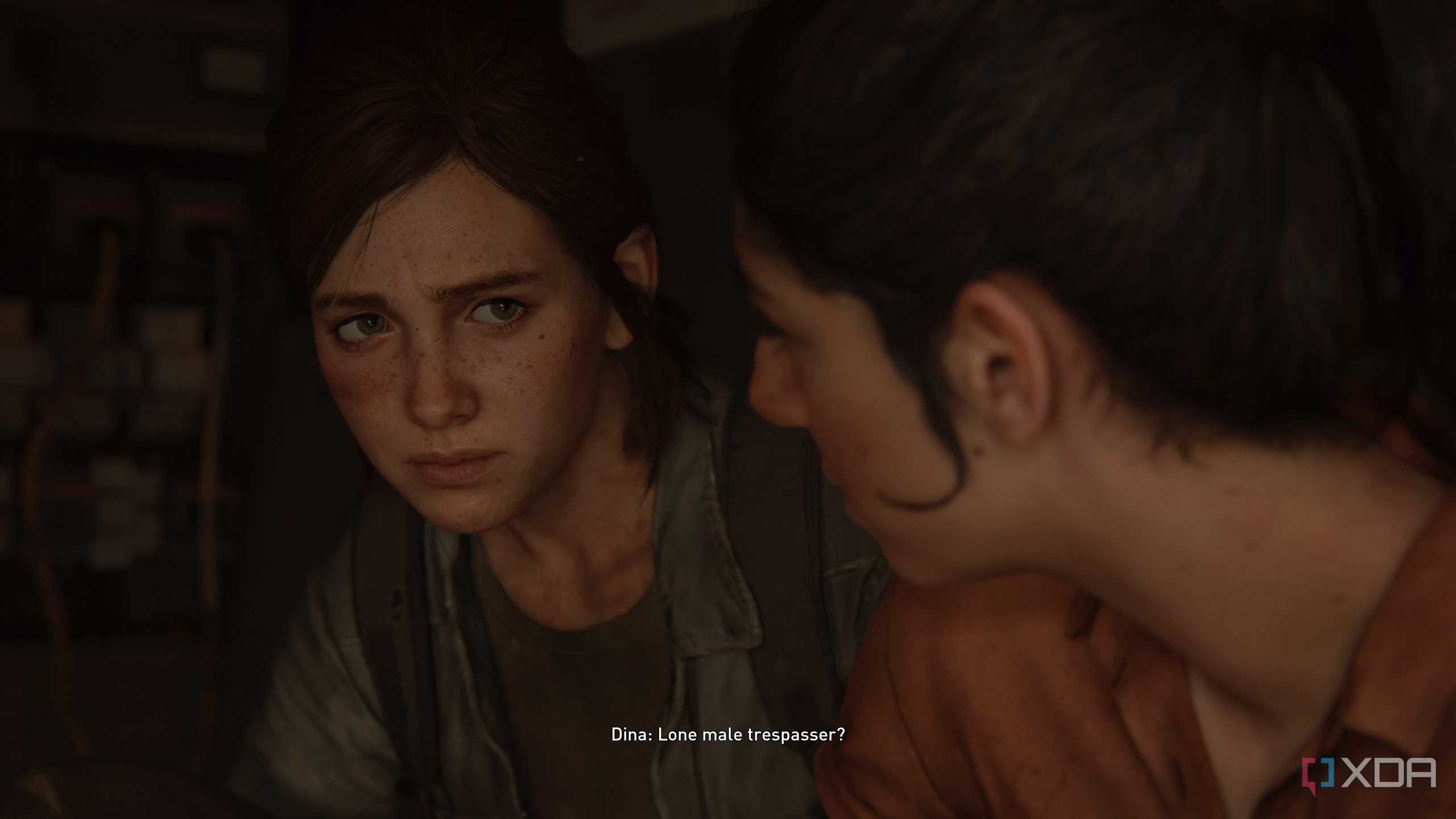 Dina and Ellie looking at each other.
