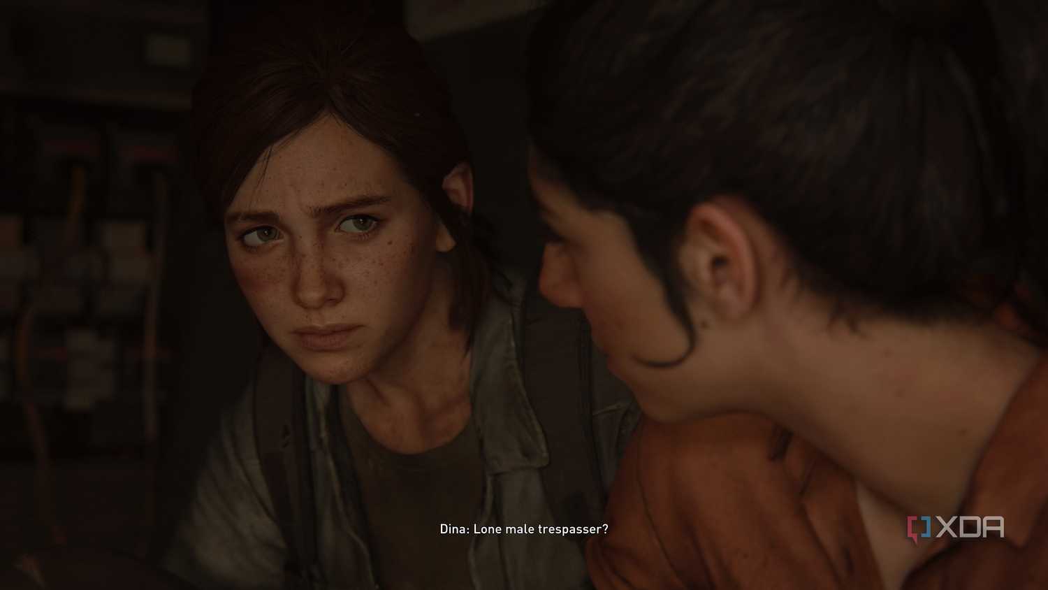 Dina and Ellie looking at each other.