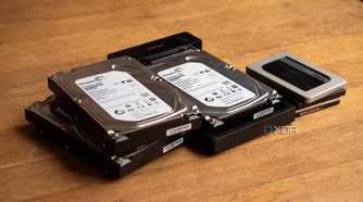 A few HDDs and SSDs, with one HDD inside of a Ugreen HDD enclosure
