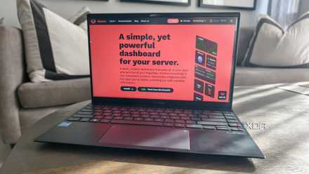 a laptop showing the homarr website