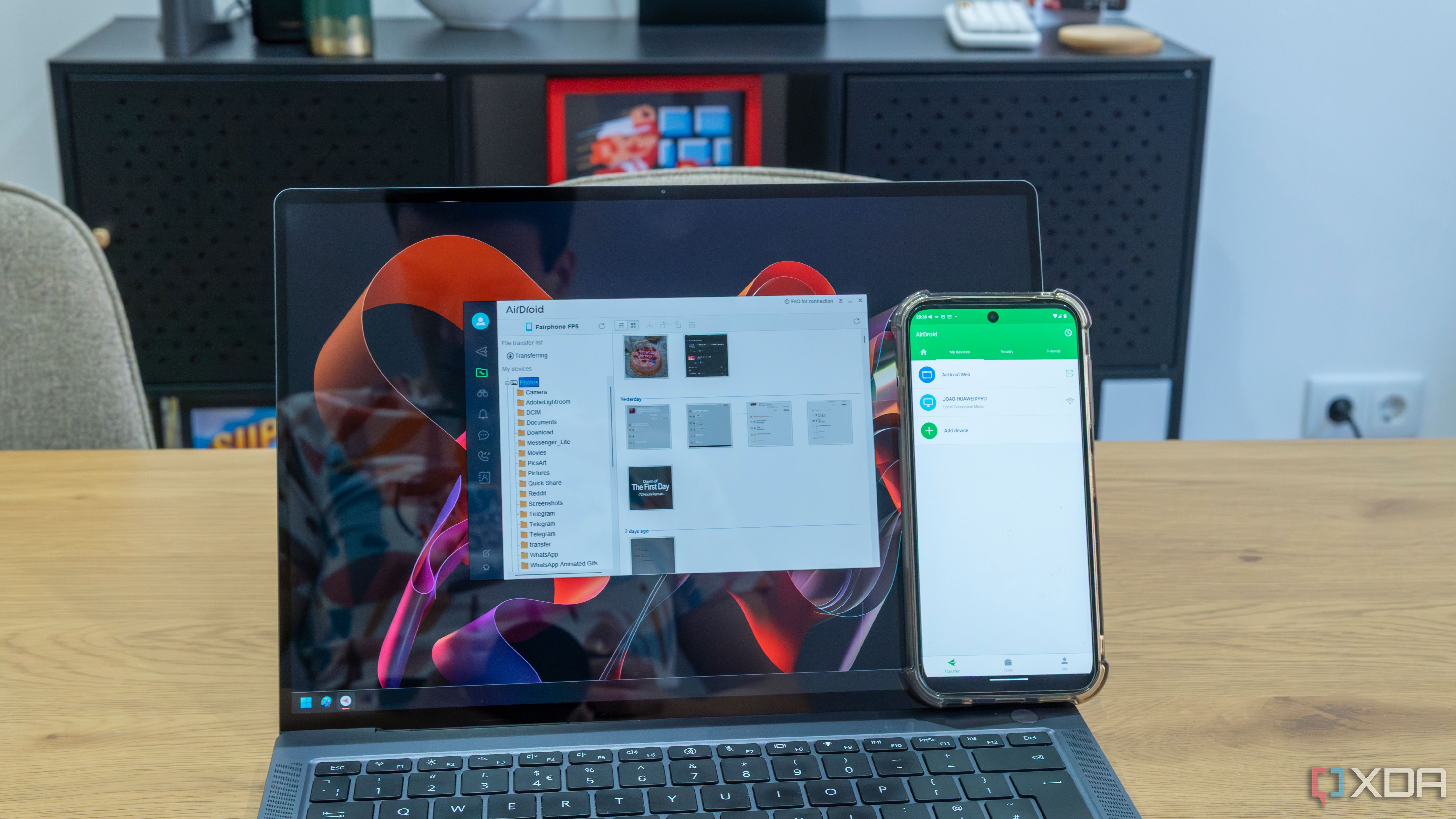 A Windows laptop and Android phone running the corresponding versions of AirDroid to link the two