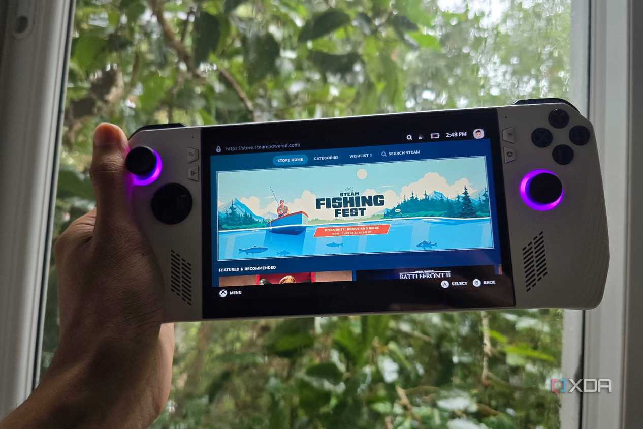 A person holding an Asus ROG Ally running SteamOS with the store page open