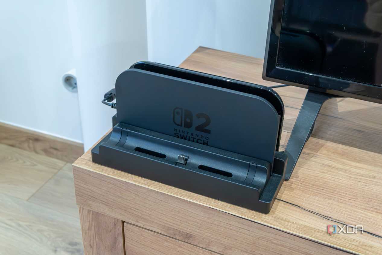 A Nintendo Switch 2 Dock with the Killswitch Dock Adapter installed on top of it
