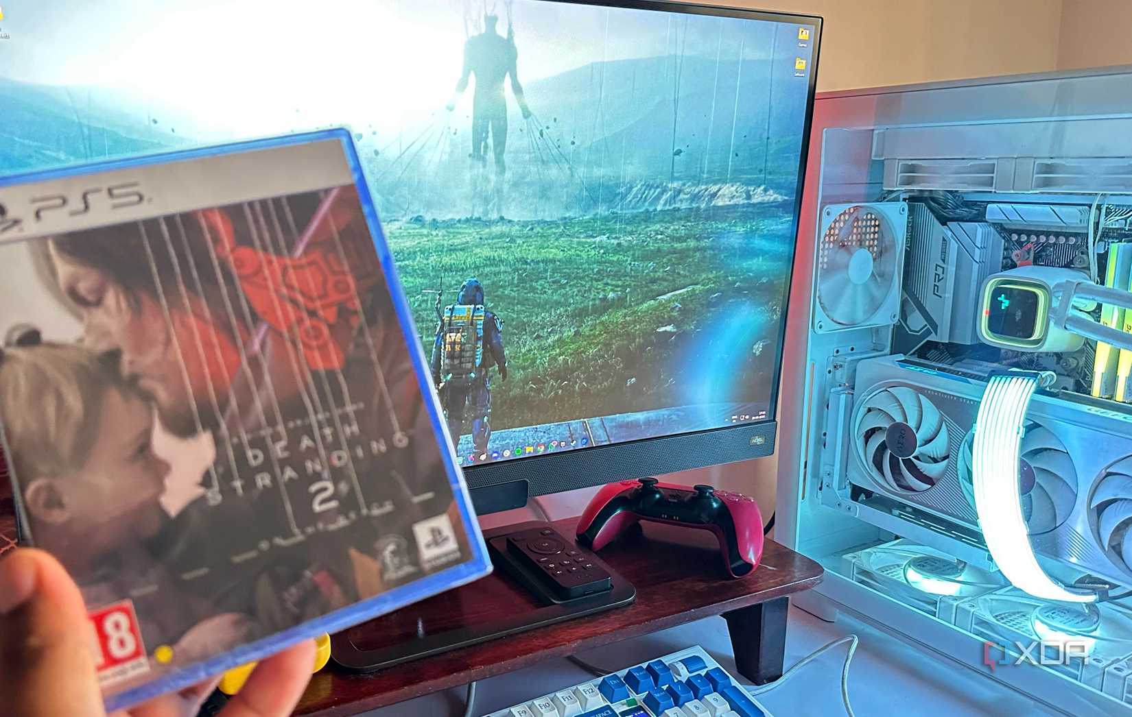 A hand holding a disc for Death Stranding 2 for the PS5.