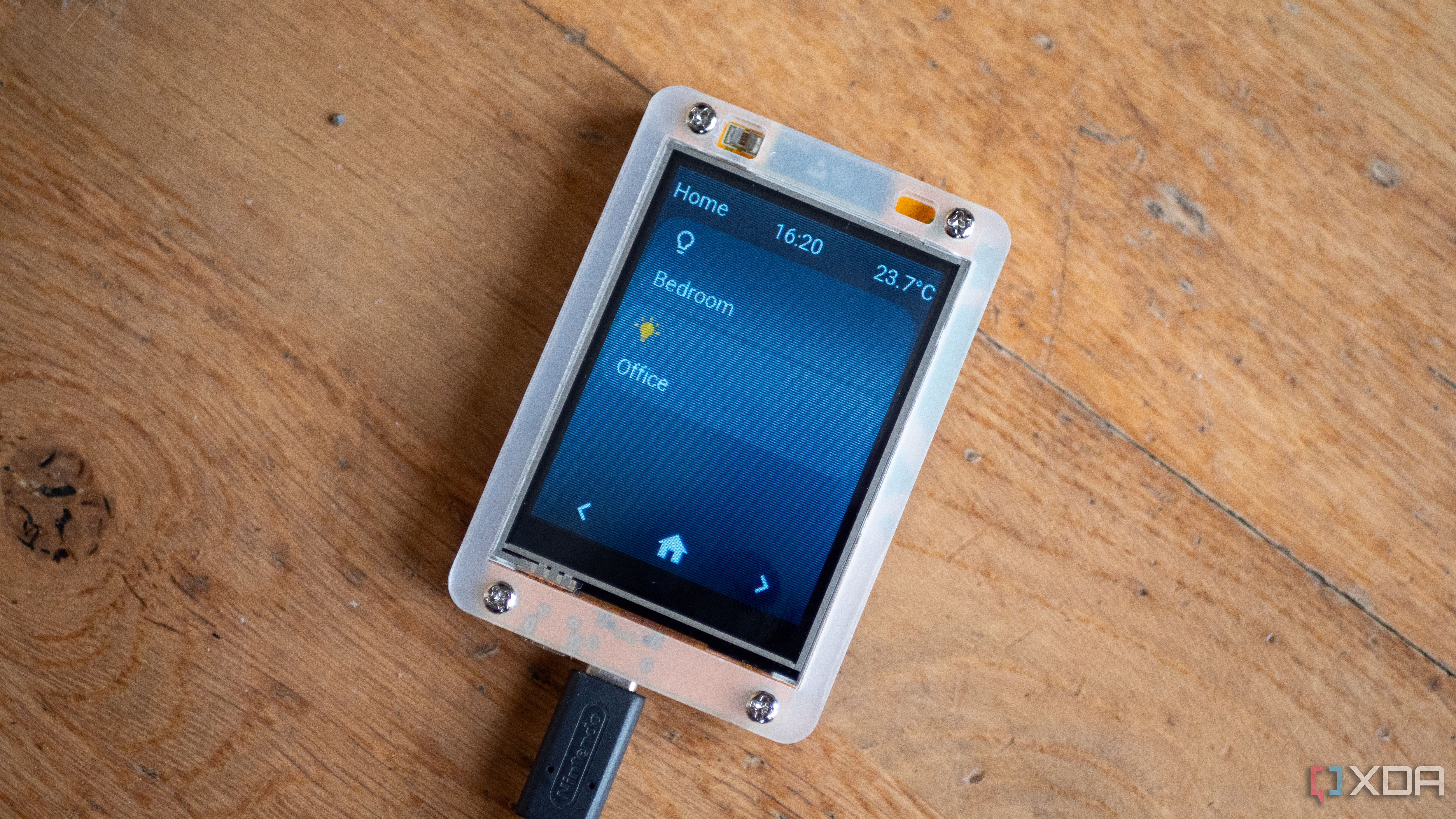 ESP32 Cheap Yellow Display showing light controls, the time, and the temperature