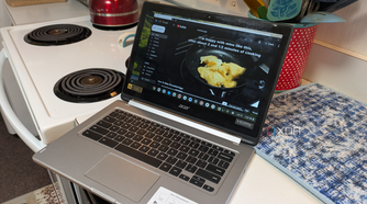 Chromebook playing YouTube cooking videos in a kitchen