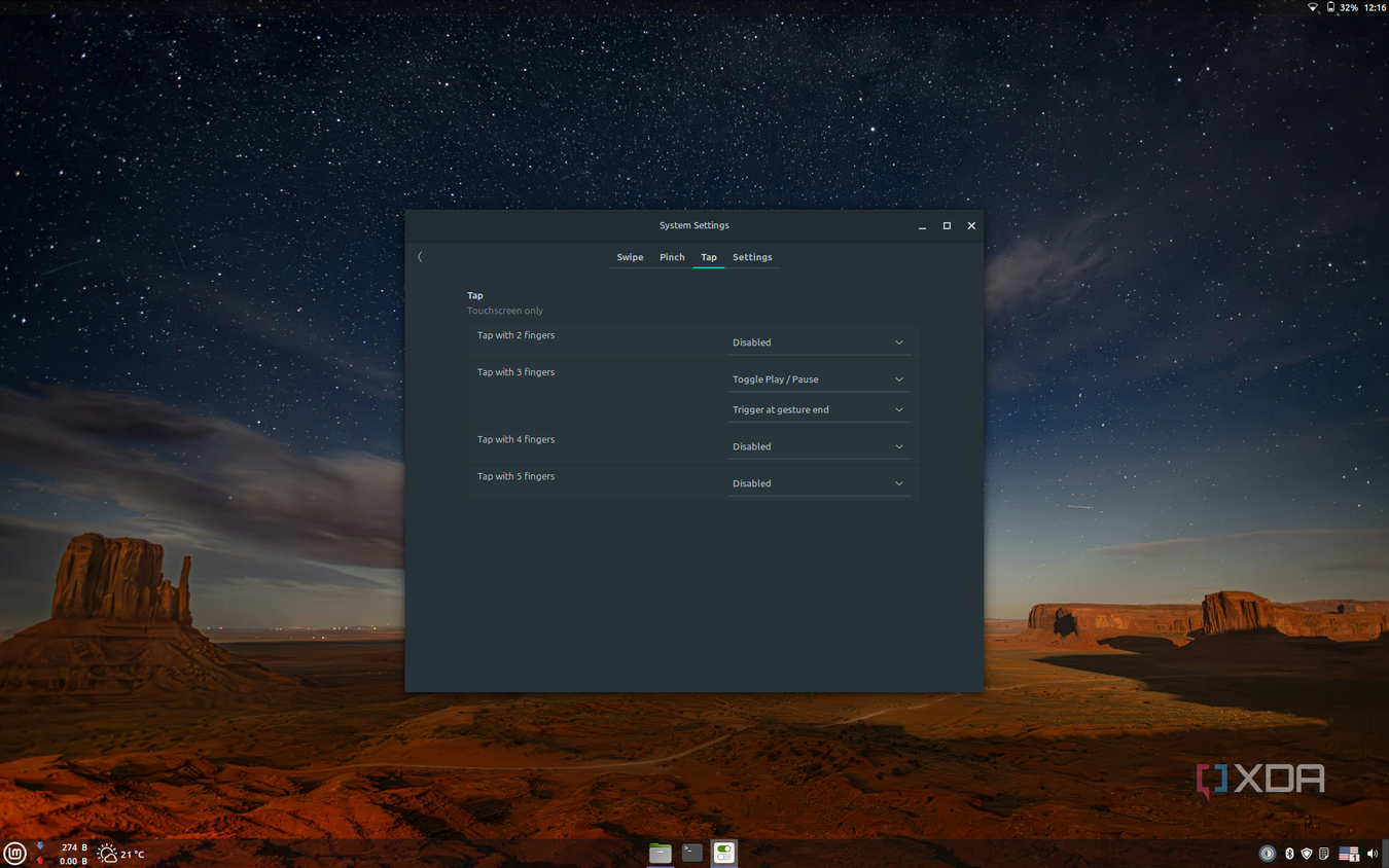 Screenshot of Linux Mint settings showing tap gestures