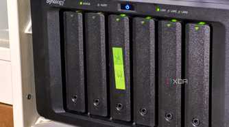 nas with green sticky label on the third drive sled