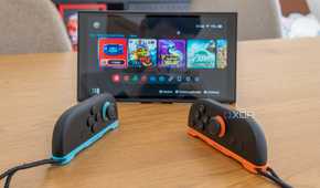 Two Joy-Con 2 controllers in mouse mode in front of a Nintendo Switch 2 in tabletop mode