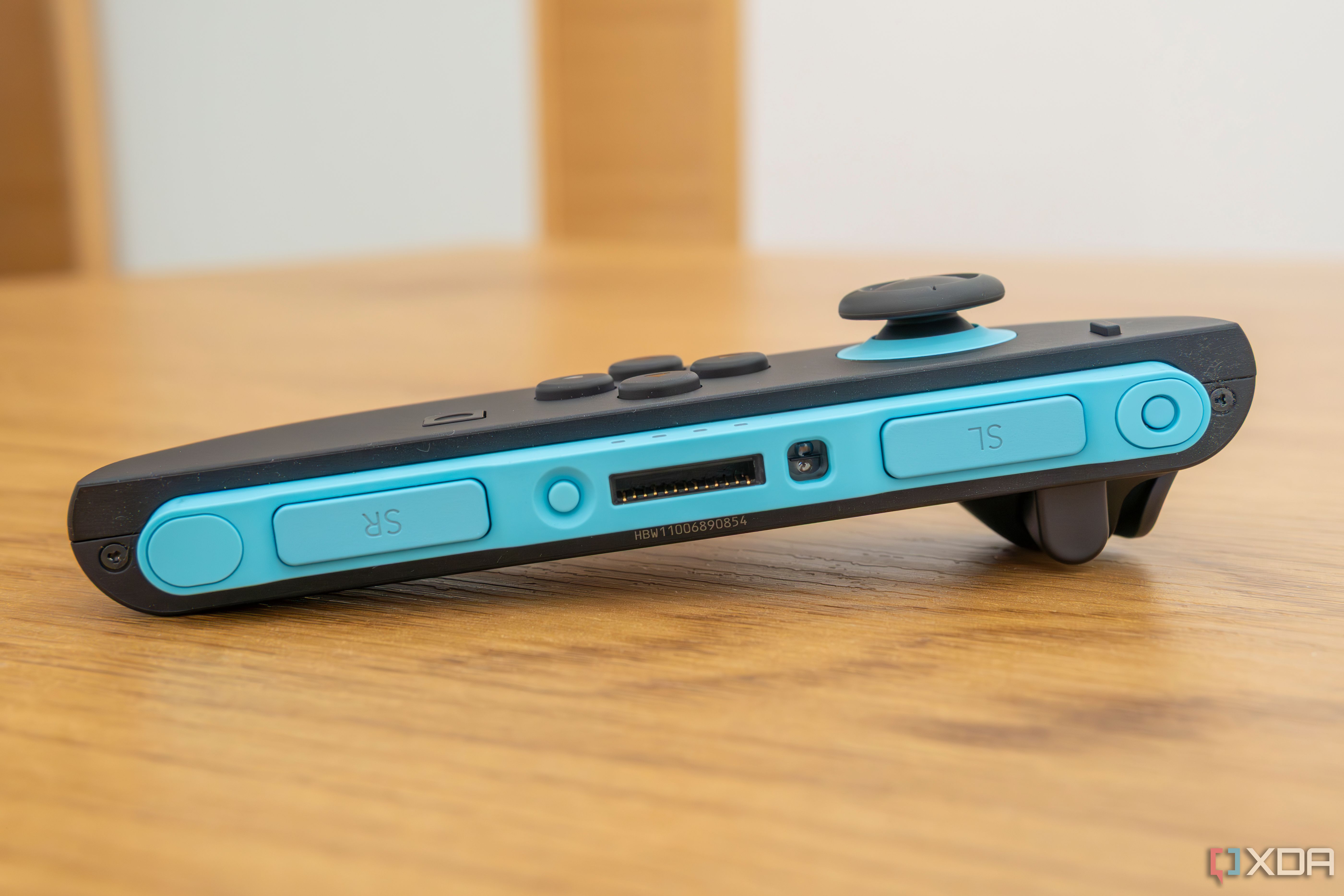 Close-up of the connector area of the Joy-Con 2 showing the mouse sensor