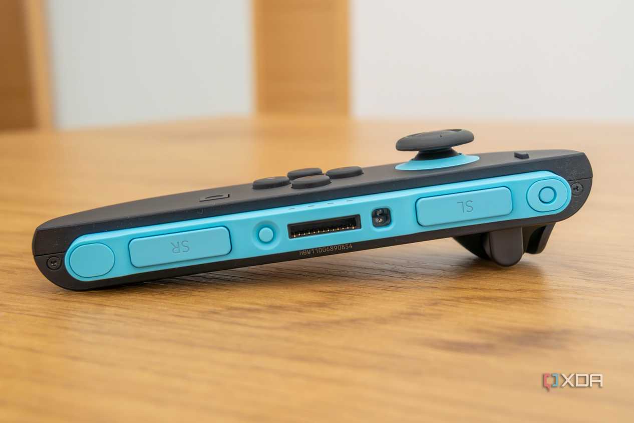 Close-up of the connector area of the Joy-Con 2 showing the mouse sensor