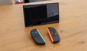 A Nintendo Switch 2 in tabletop mode with detached Joy-Con 2 controllers in front of it