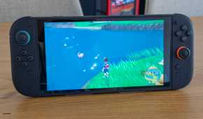 A Nintendo Switch 2 running Pokémon Scarlet and Violet with the Joy-Con attached