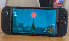 A Nintendo Switch 2 running Zelda Tears of the Kingdom with the Joy-Con attached
