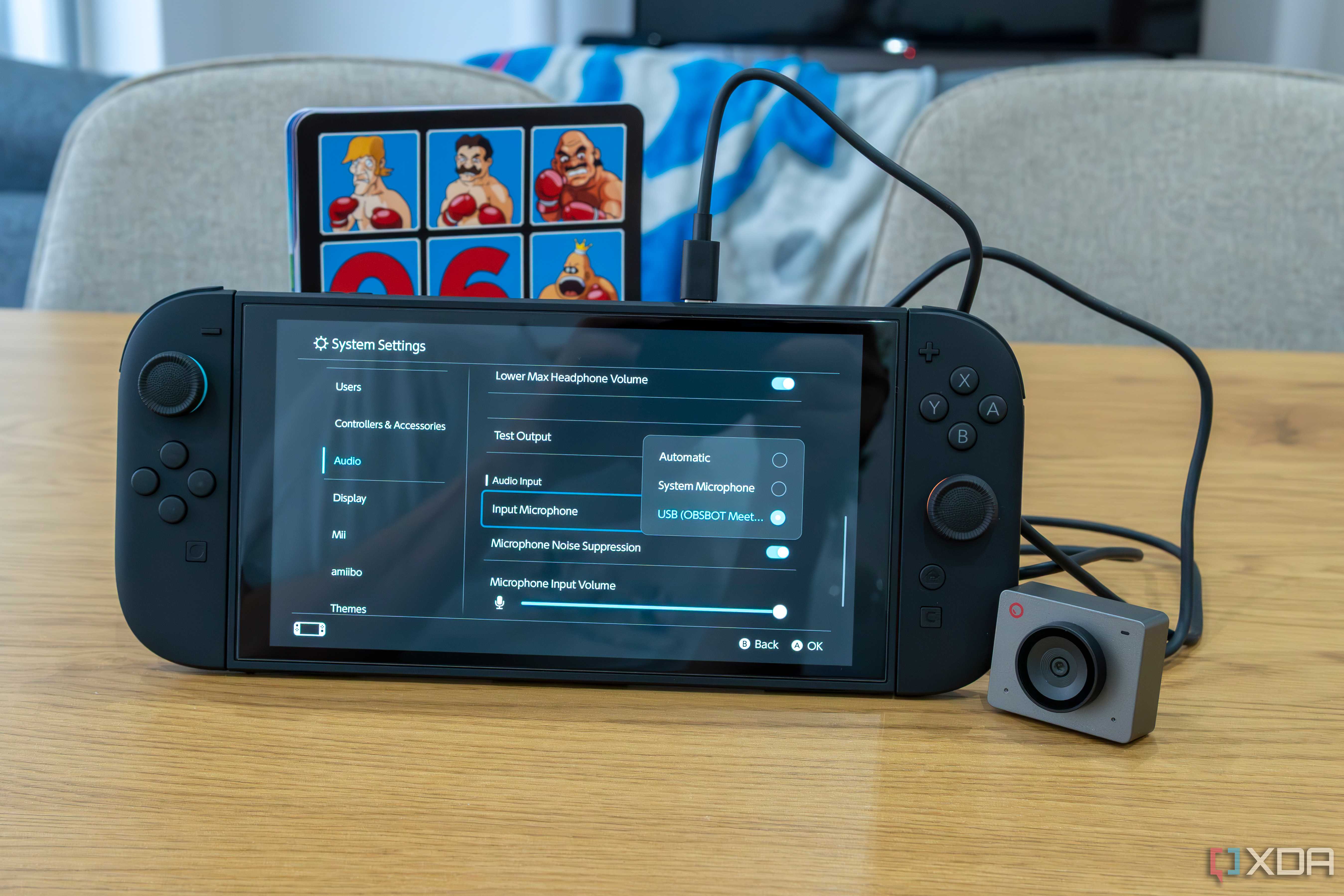 A Nintendo Switch 2 with an Obsbot Meet 2 connected. The camera's microphone is detected in the console's settings