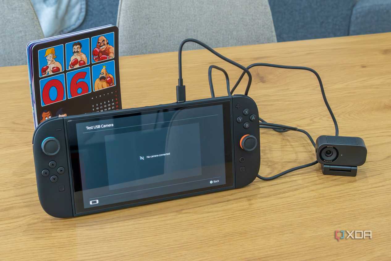 A Nintendo Switch 2 with an Insta360 Link 2C connected. The console indicates no camera is connected