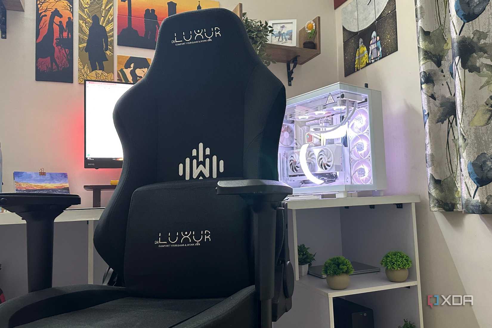 An image of a gaming chair next to a gaming PC.