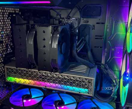 Please stop benchmarking your home server like it's a desktop PC 9 A photo of a PC build powered on with RGB lights and an air cooler