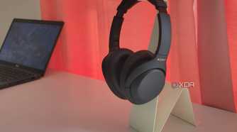 Black Sony headphones on a white stand