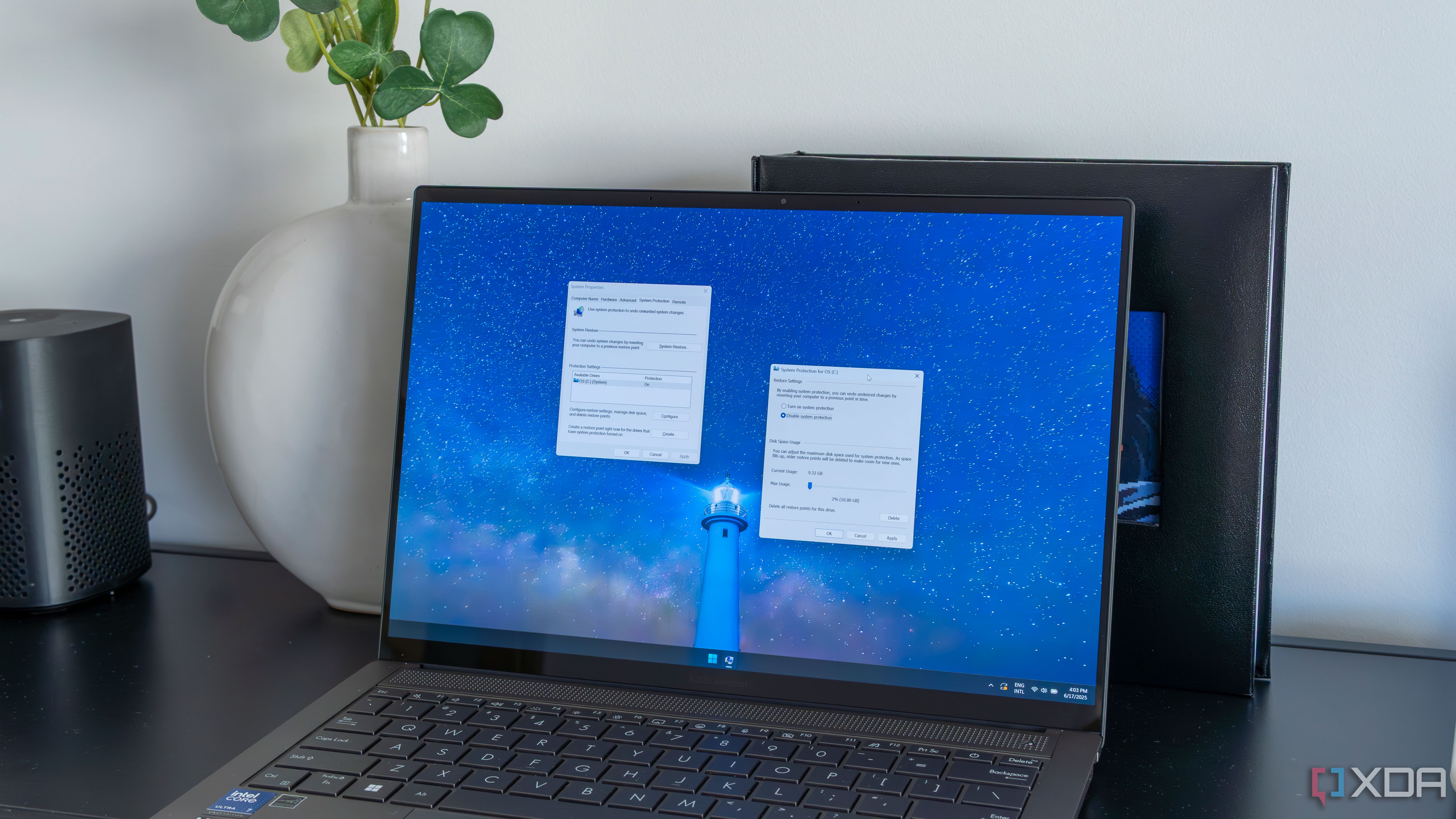 Una computadora portátil con Windows 11 que muestra la configuración de Restaurar sistema
