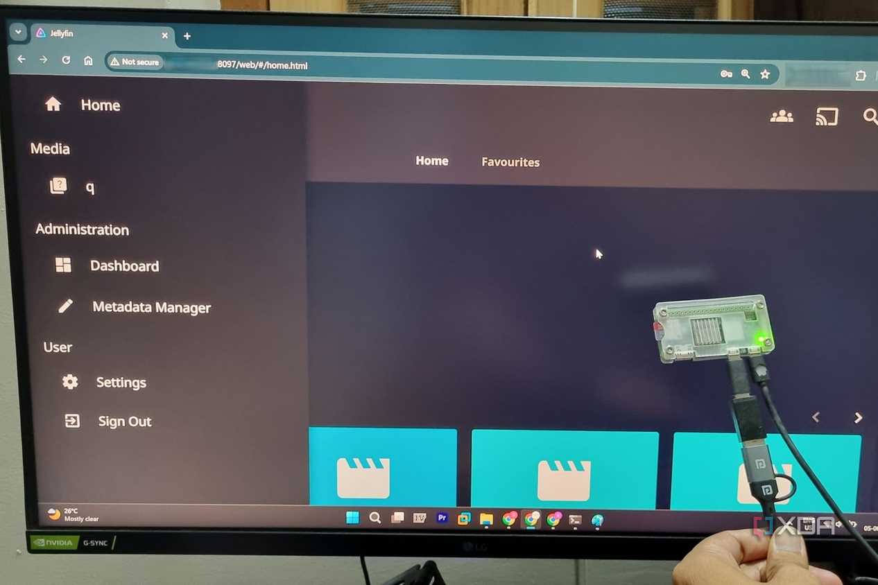 photo of Windows 11 desktop with a raspberry pi zero2w with jellyfin