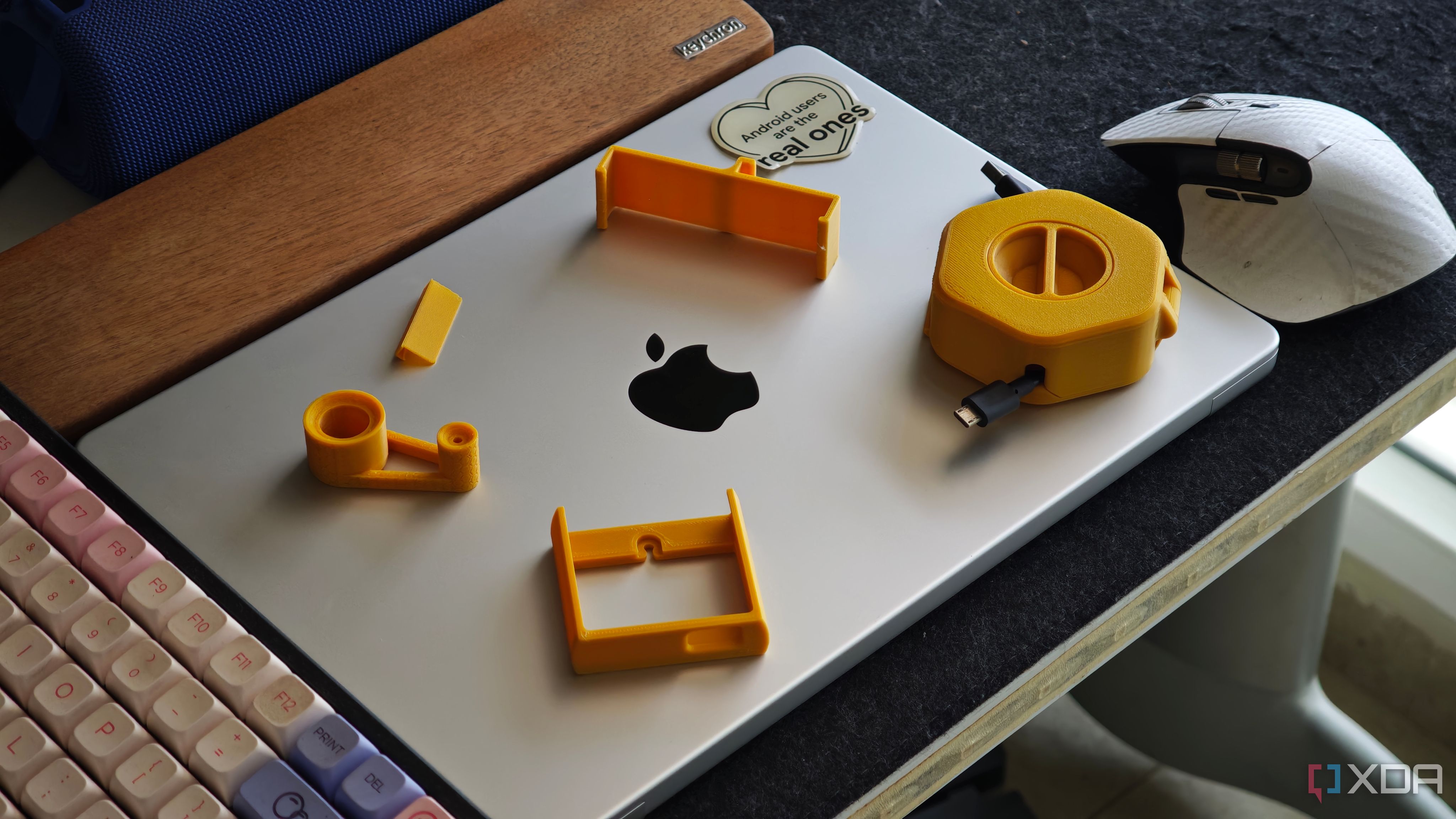 3D printed laptop accessories sitting on top of a laptop
