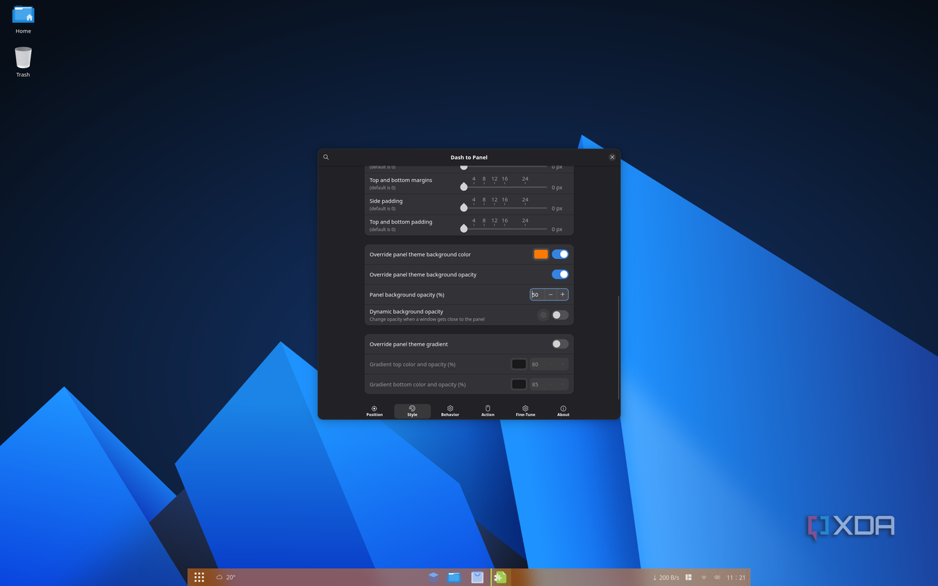Screenshot of AnduinOS taskbar settings showing a colored taskbar with adjusted transparency